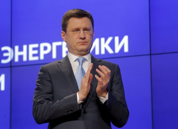 Russian Energy Minister Alexander Novak applauds during a session of the ministry's board in Moscow, Russia, April 8, 2016. REUTERS/Maxim Shemetov - RTSE50E